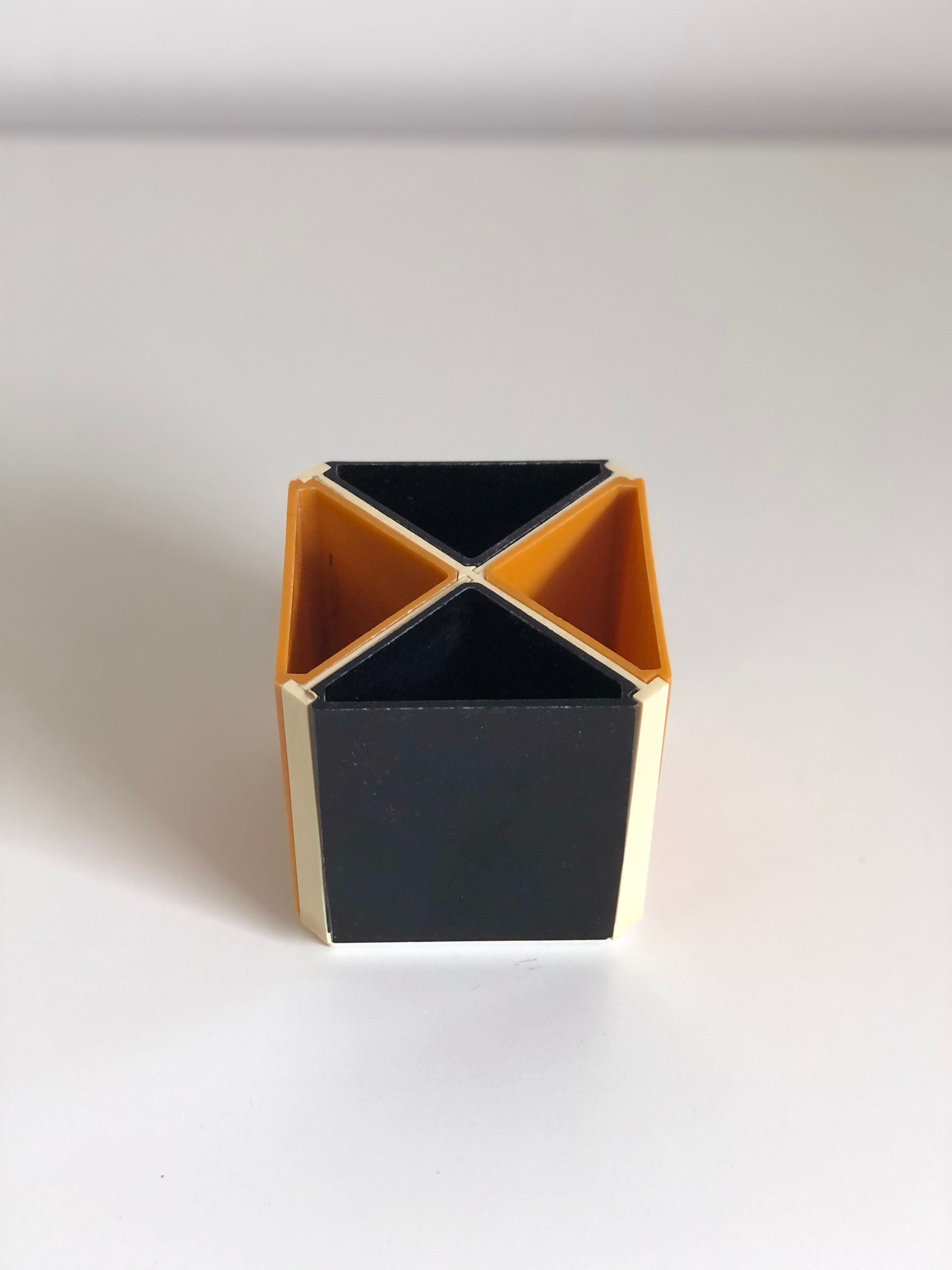 Black and orange plastic compartment pencil pot, 1970