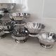 10 stainless steel dessert / ice cream bowls in Guy Degrenne style, flower shape.