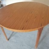 Teak round table with extension cords