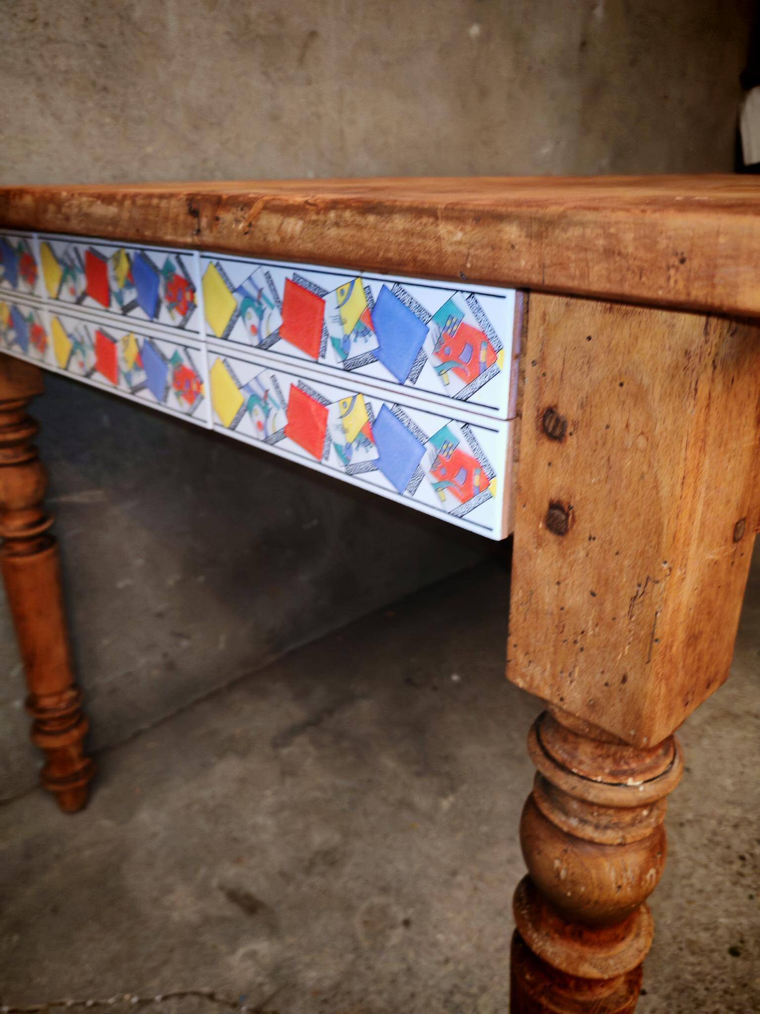 Small farmhouse table in light wood and tiled floors