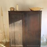 Old black wardrobe - wooden drawers and labels of origin