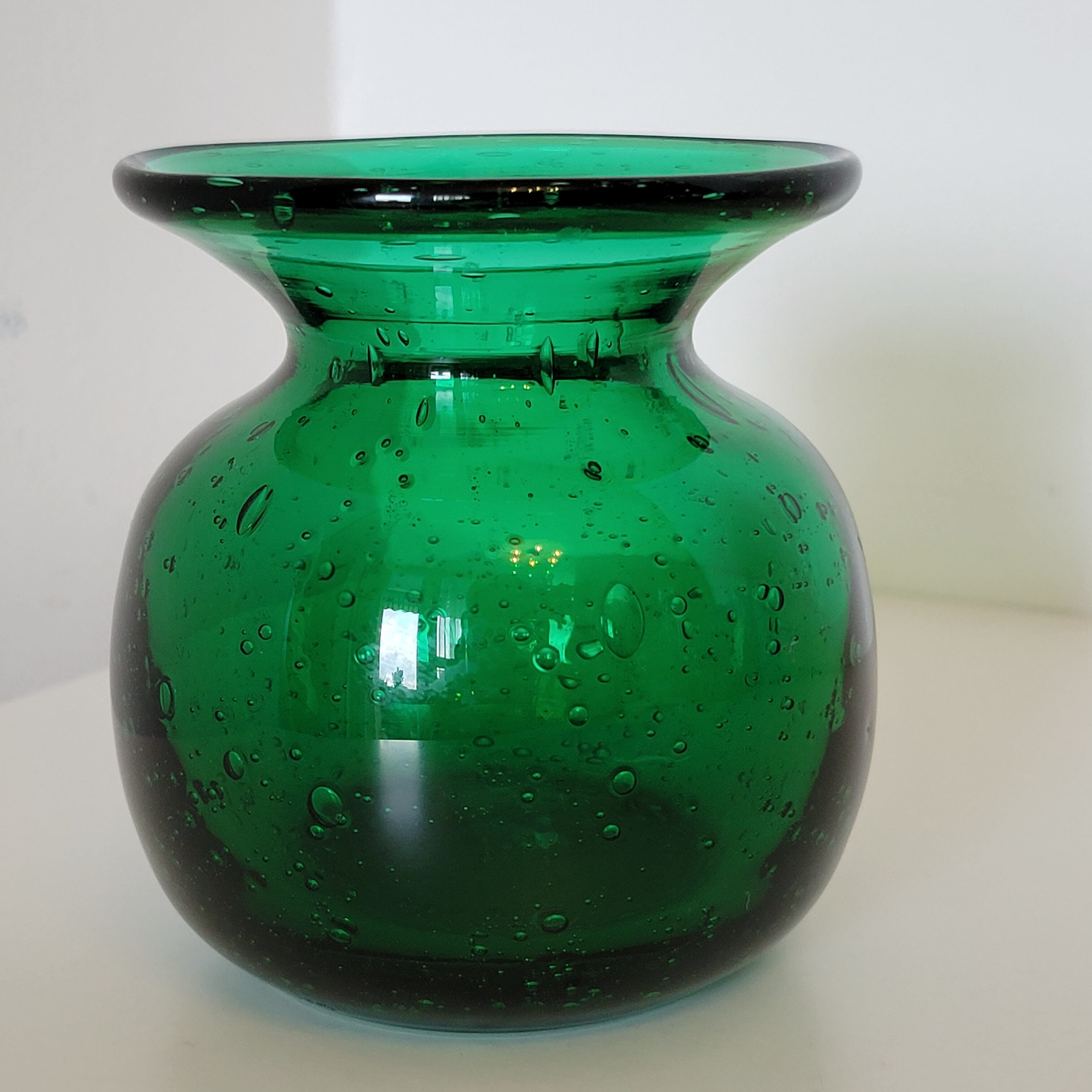 Small green bubbled blown glass vase