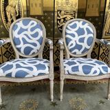 Pair of restored Louis XVI convertible armchairs