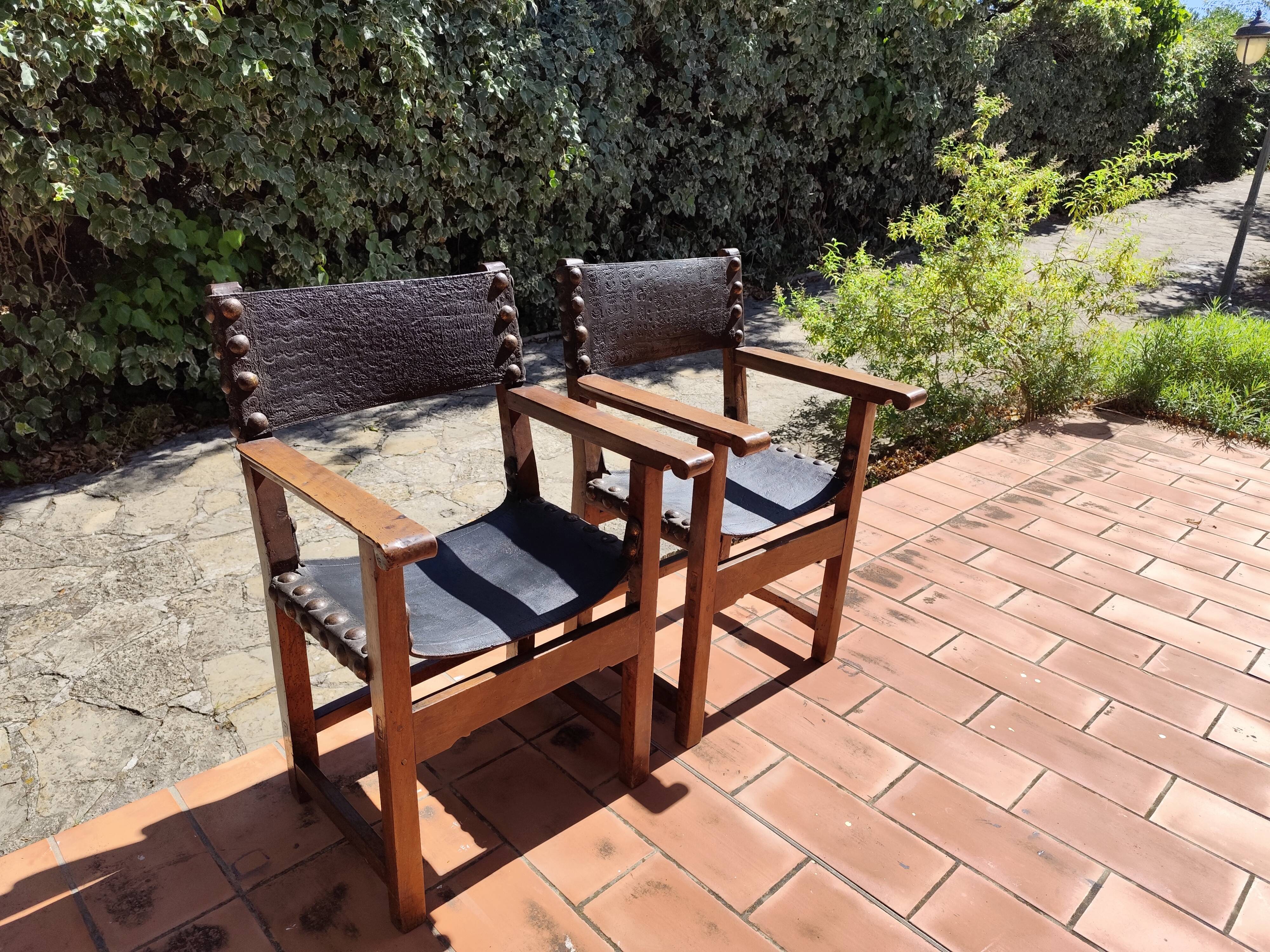 Pair of French Brutalist oak and leather armchairs 1920