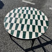 Round coffee table in green and white zellige – handcrafted Moroccan.