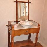 Old walnut dressing table with its toiletries