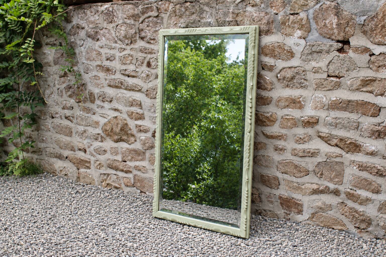 Large antique bevelled mirror in carved solid wood, green lizard – 129 × 75