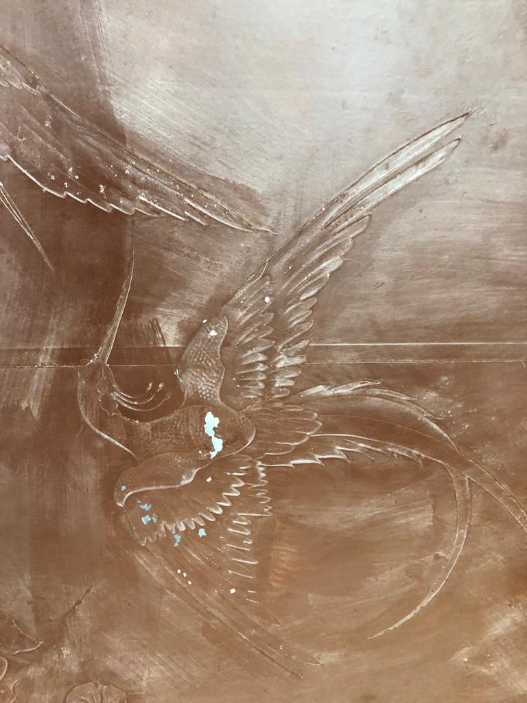 Mirror decorated with birds