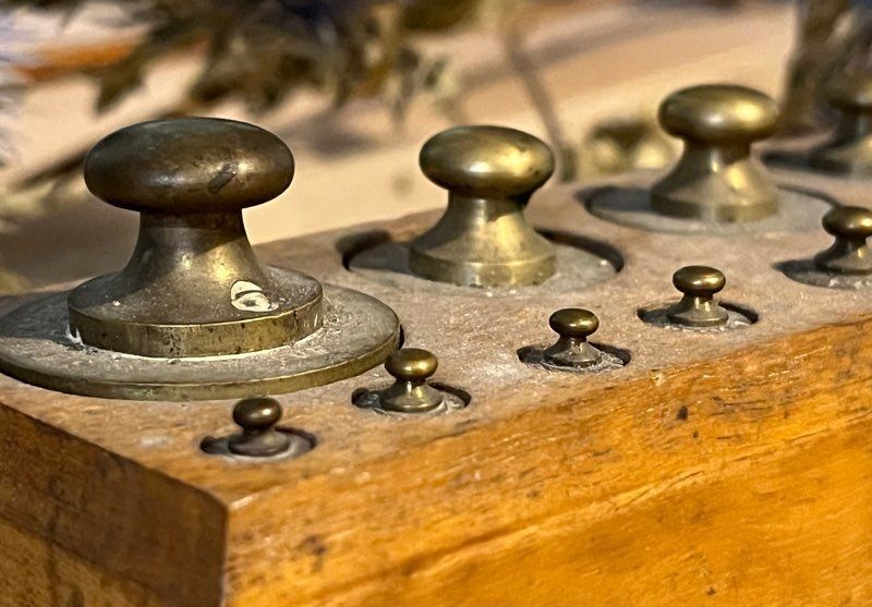 Complete series of brass weights for scales