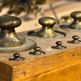 Complete series of brass weights for scales