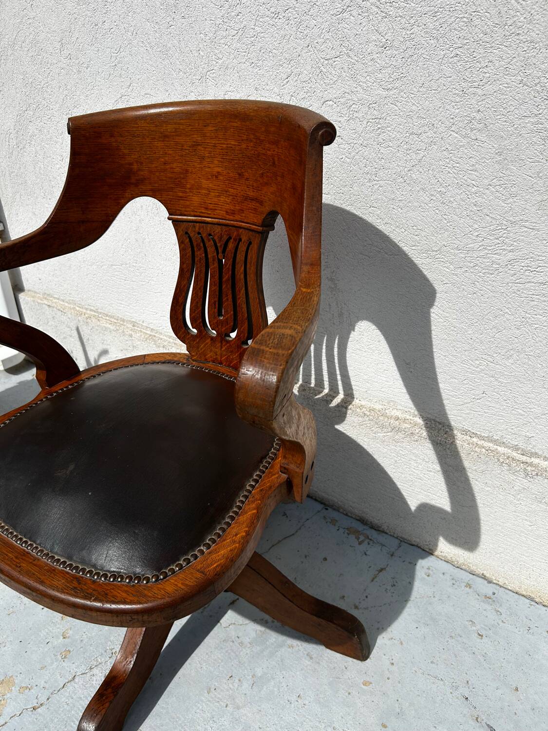 Milwaukee Chair Co. swivel office chair – leather and wood – circa