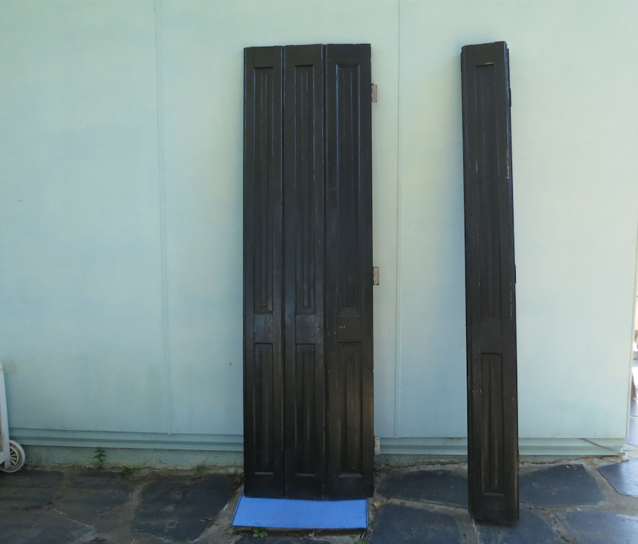 4 Pairs of wooden shutters painted black