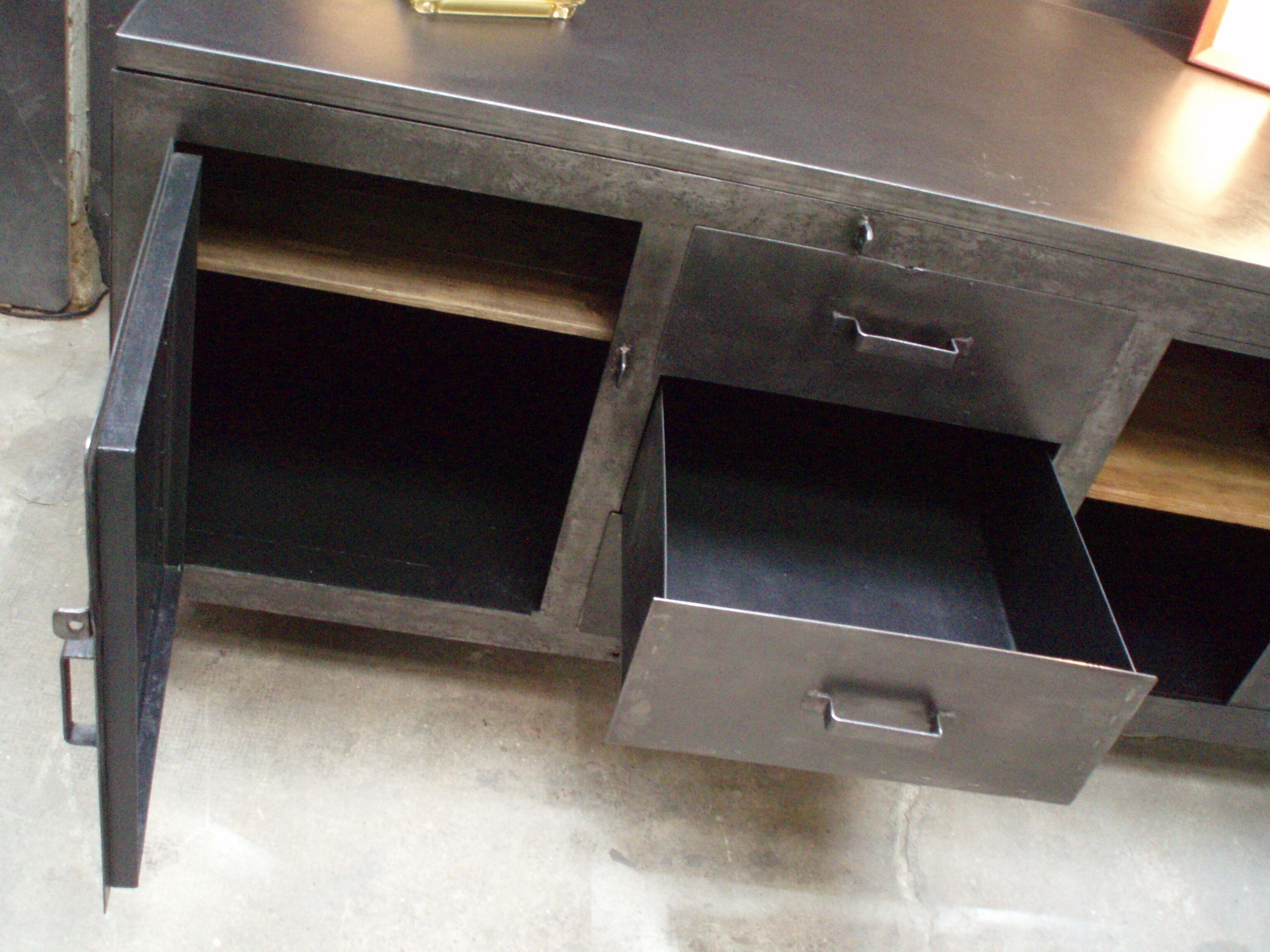 Former industrial workbench in metal