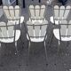 Set of six "Peacock Style" dining chairs.
