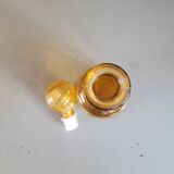 Amber molded glass carafe with stopper