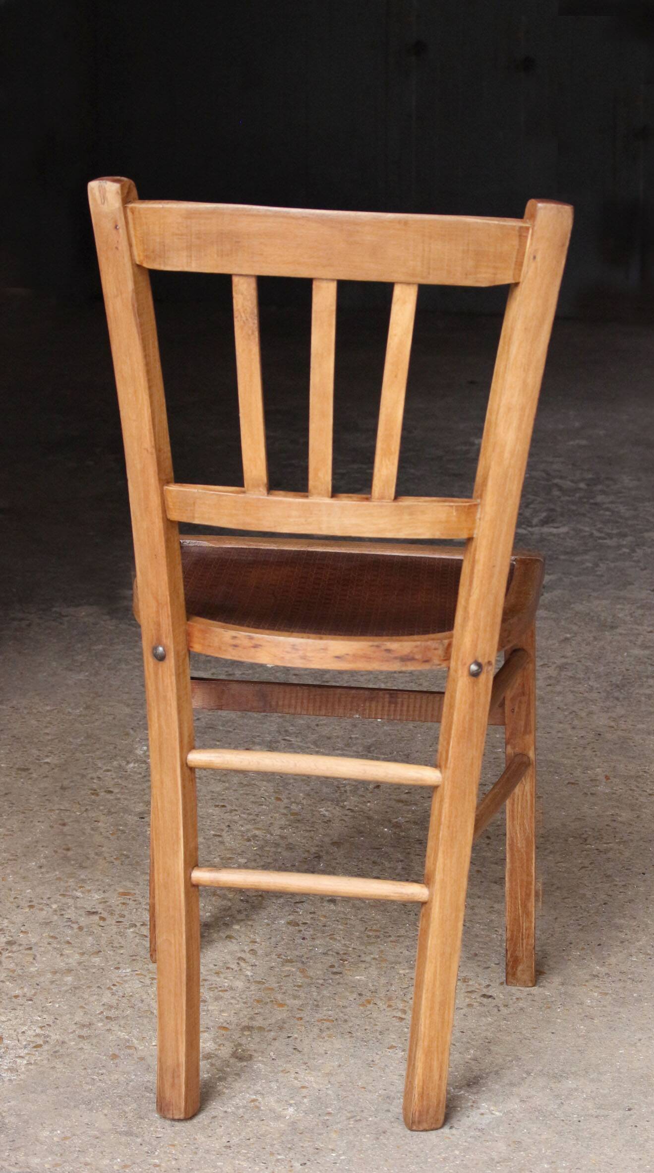 Early 20th century wooden bistro chair.