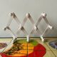 Vintage accordion coat rack in white painted wood