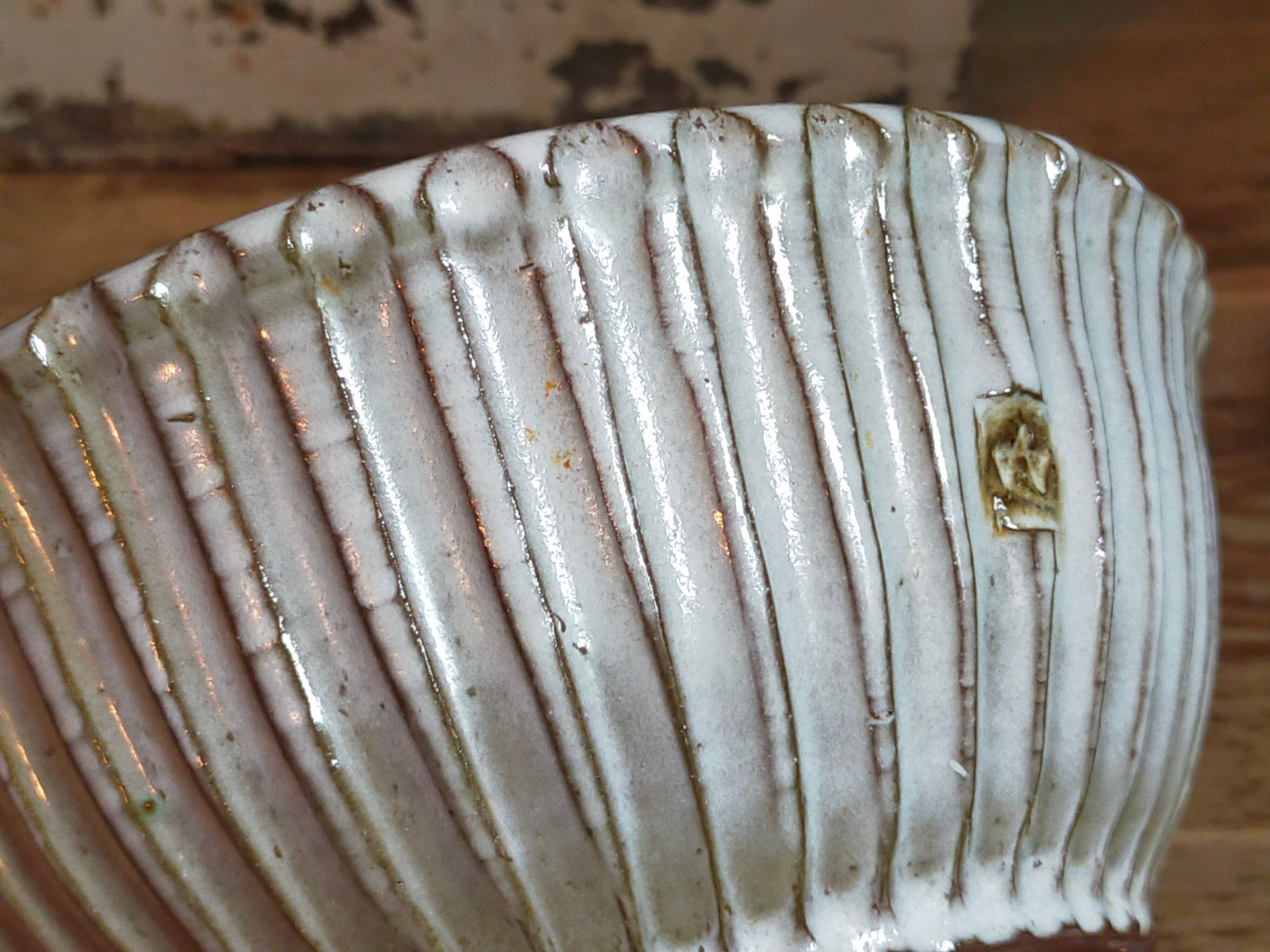 Vintage fluted enameled earthenware potter's salad bowl