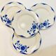 4 white porcelain plates with blue flowers