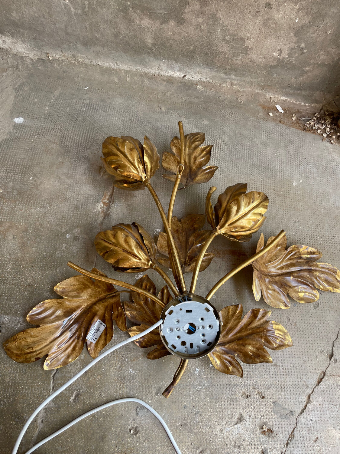 Golden wall lamp foliage