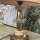 Table lamp in gilded metal, bakelite and antique plexiglass
