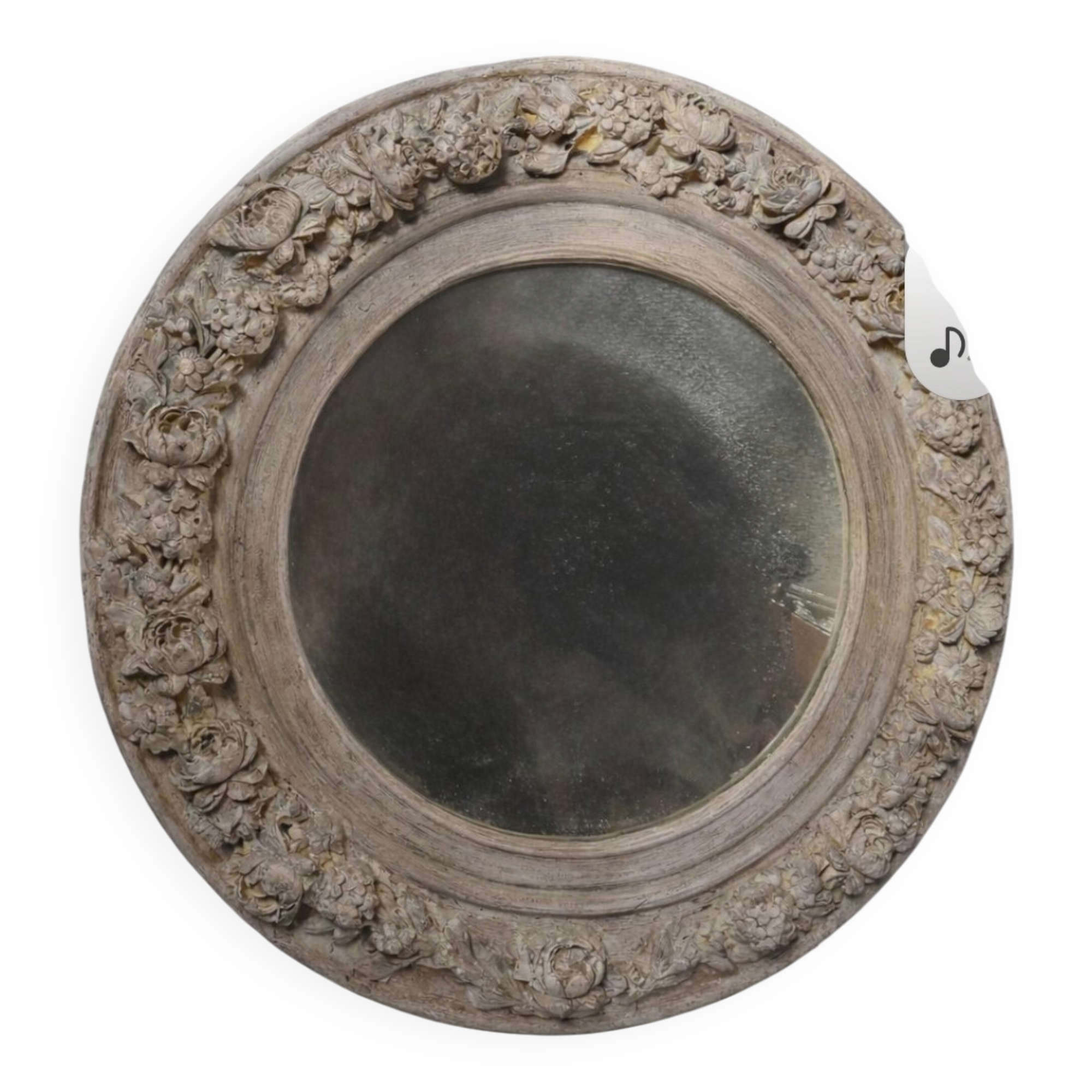 Round mirror with floral patterns