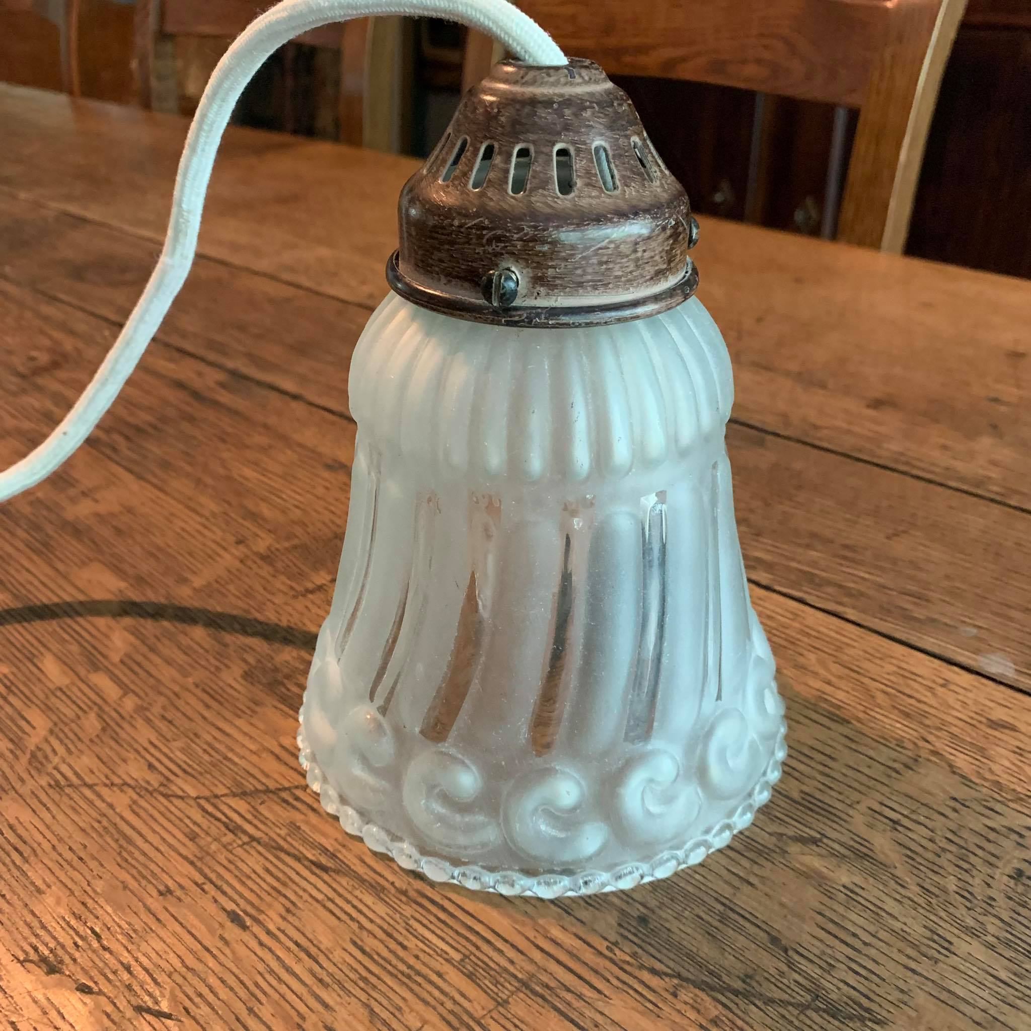 Frosted pressed molded glass suspension