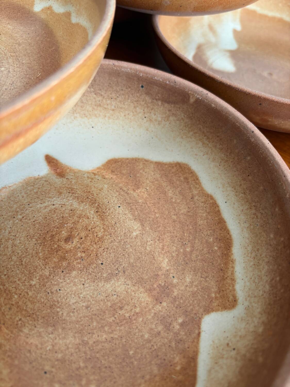 Lot of vintage 1970s stoneware deep plates - handmade beige ceramics.