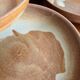 Lot of vintage 1970s stoneware deep plates - handmade beige ceramics.