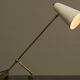 Mid Century adjustable table lamp with perforated shade from the 1950s.