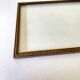 Wooden frame carved in beads, glazed, gray cardboard back and irzft paper