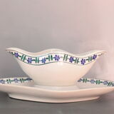 Saucière ancienne française blanche et bleue, en porcelaine opaque, à motif de fleurs bleues