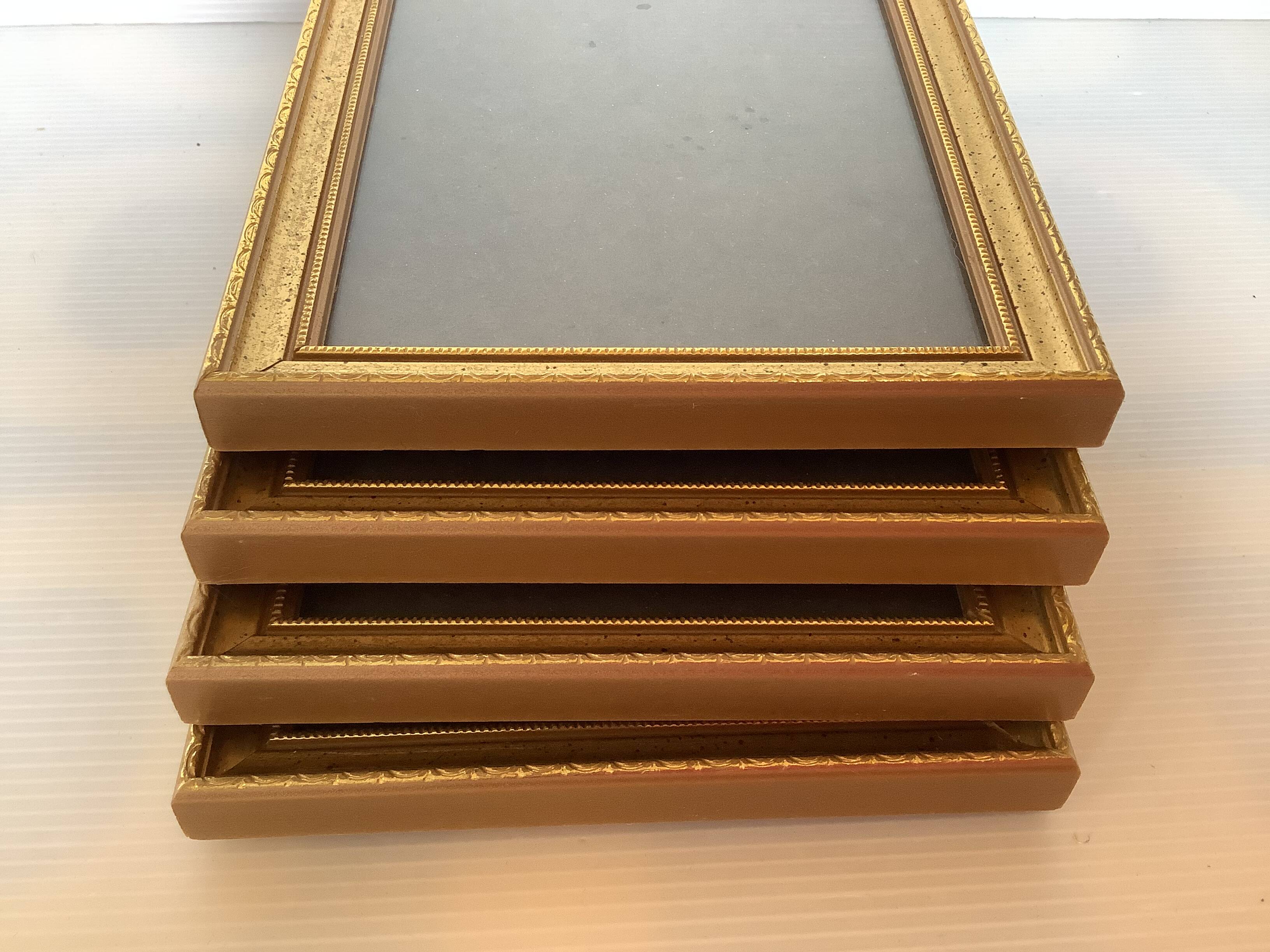 Four gilded wood frames to place or hang