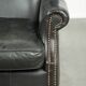 Black cowhide wingback armchair in classic English style
