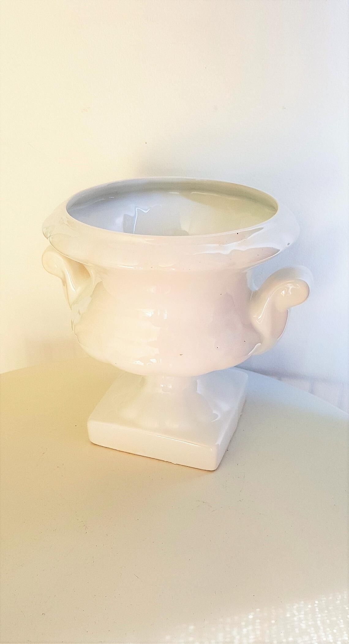 White ceramic medici-shaped planter