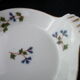 Set of 4 porcelain dishes with fire L. Lourioux de Foecy