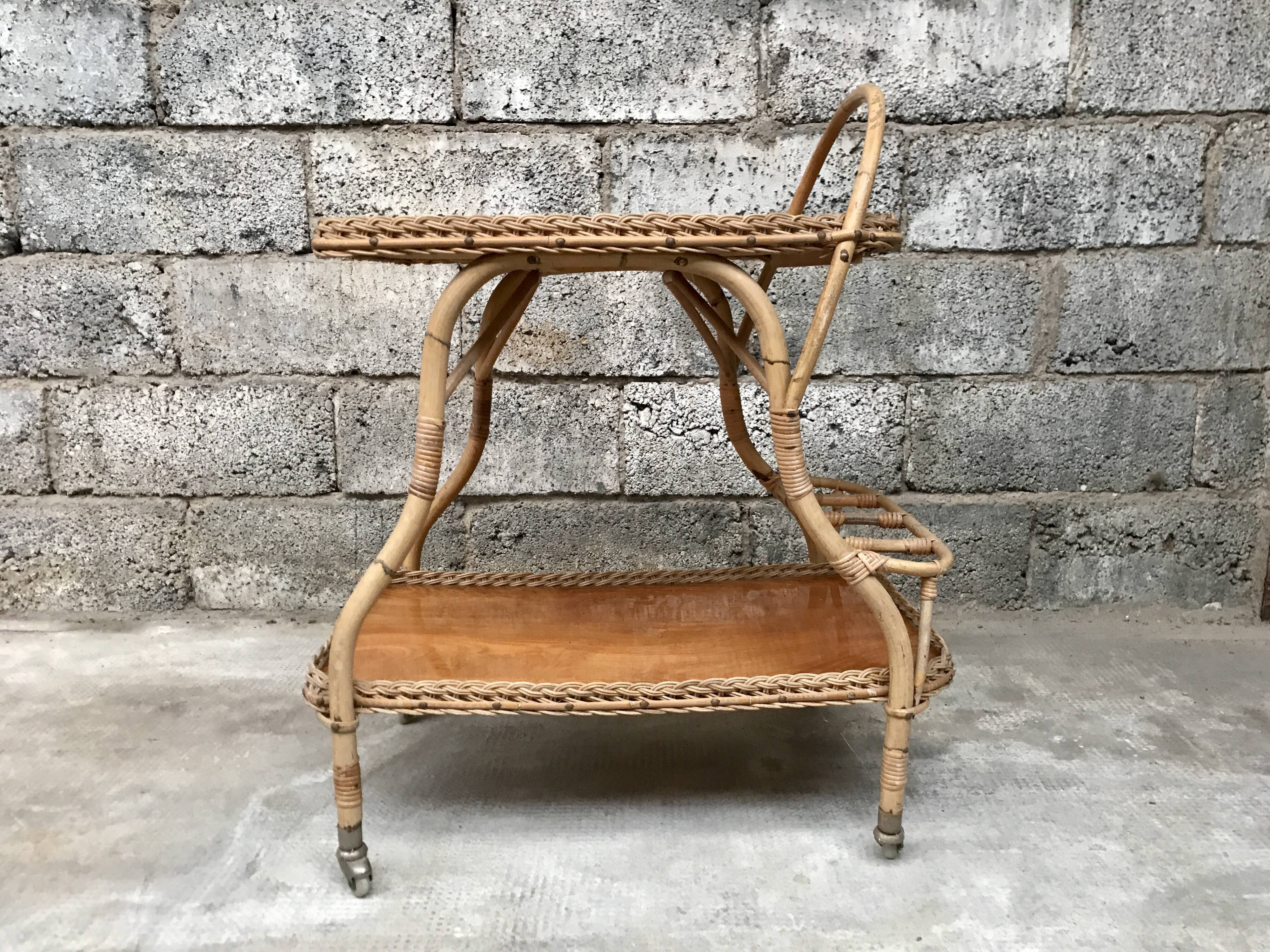 Rolling dessert in woven wicker bamboo rattan with 1950 bottle holder