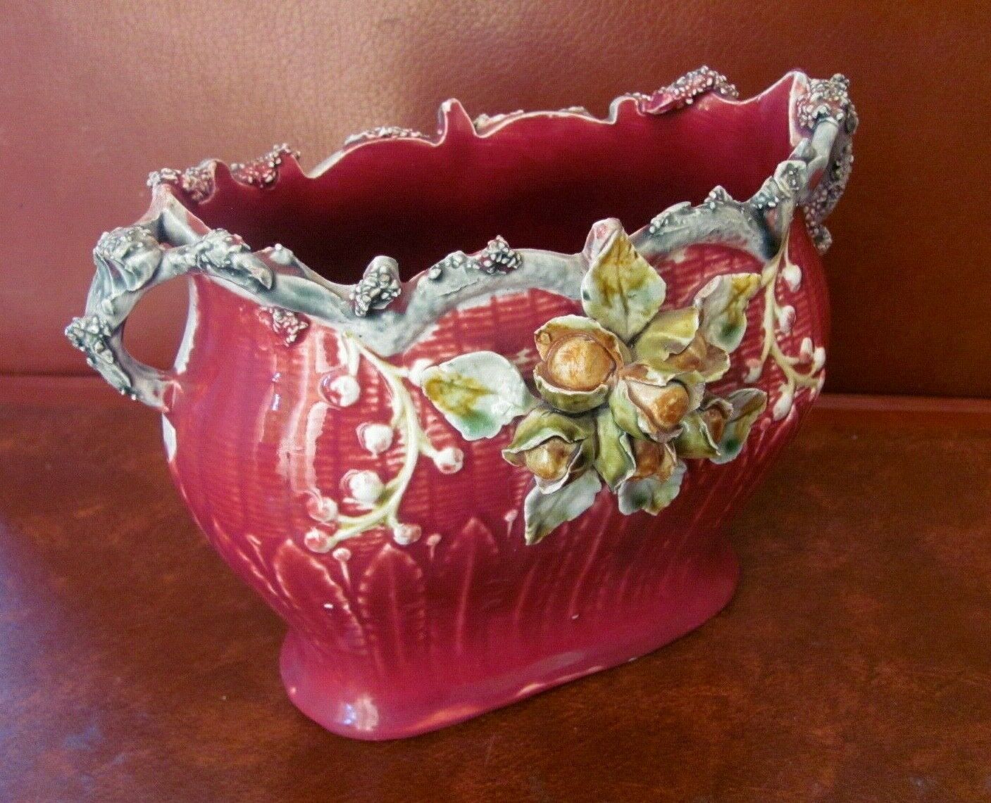 Garden cover in red slurry decorated with flower buds