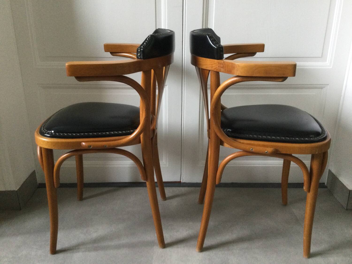 Pair of curved wooden bistro armchairs