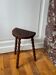 Tripod stool made of turned wood
