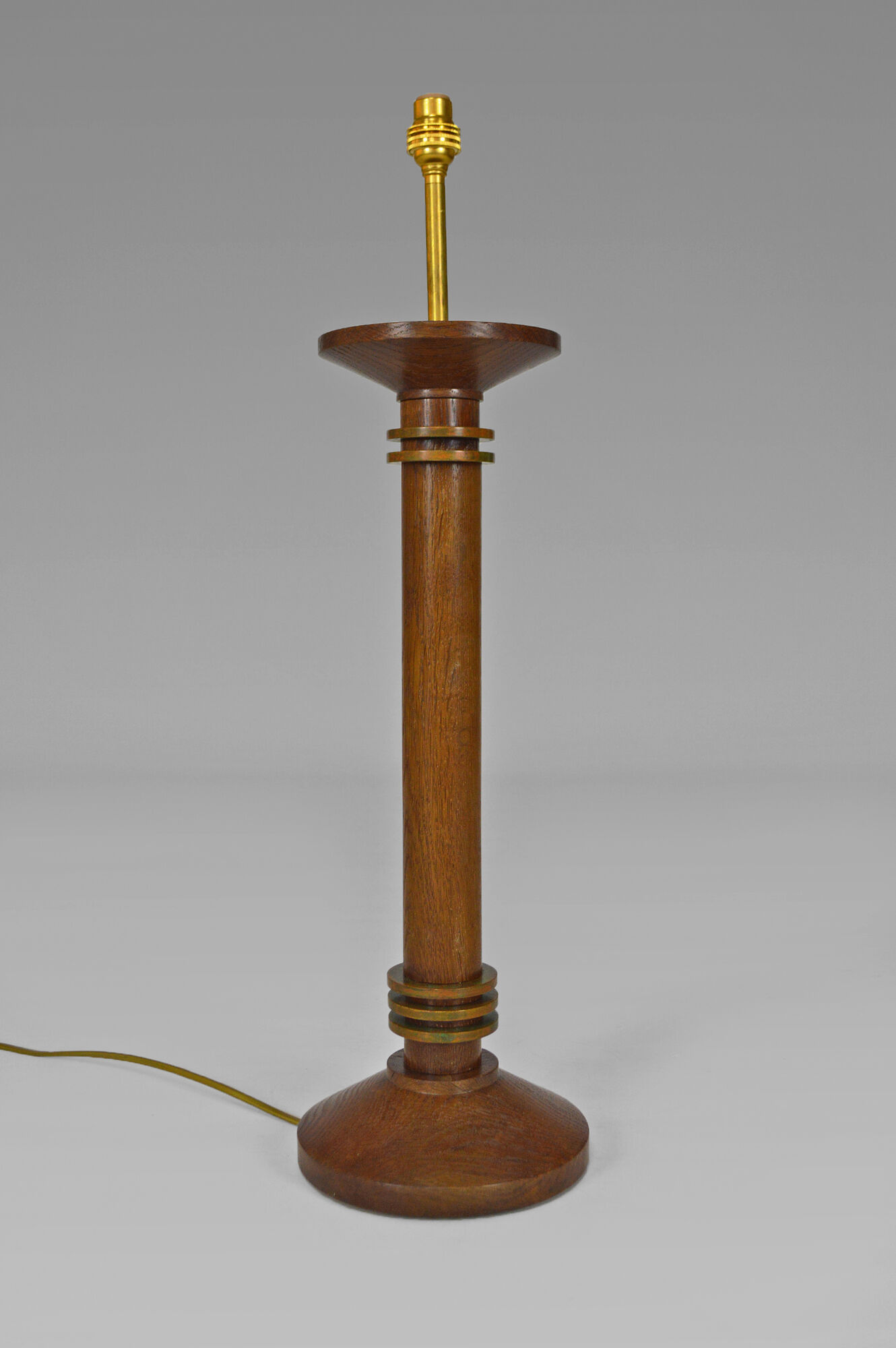 Pair of art deco lamps in wood and patinated bronze around 1930