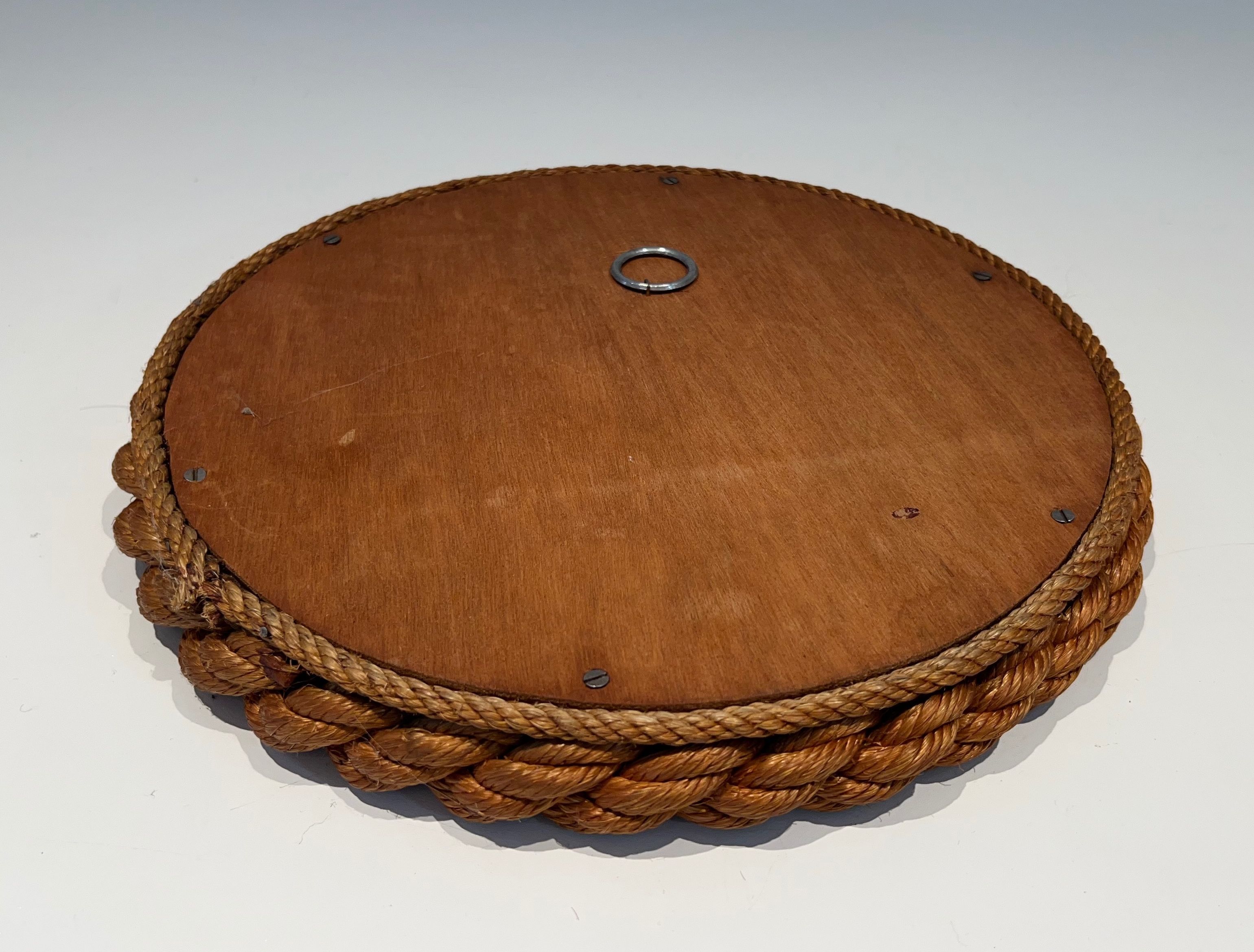Round mirror in Audoux Minet rope.