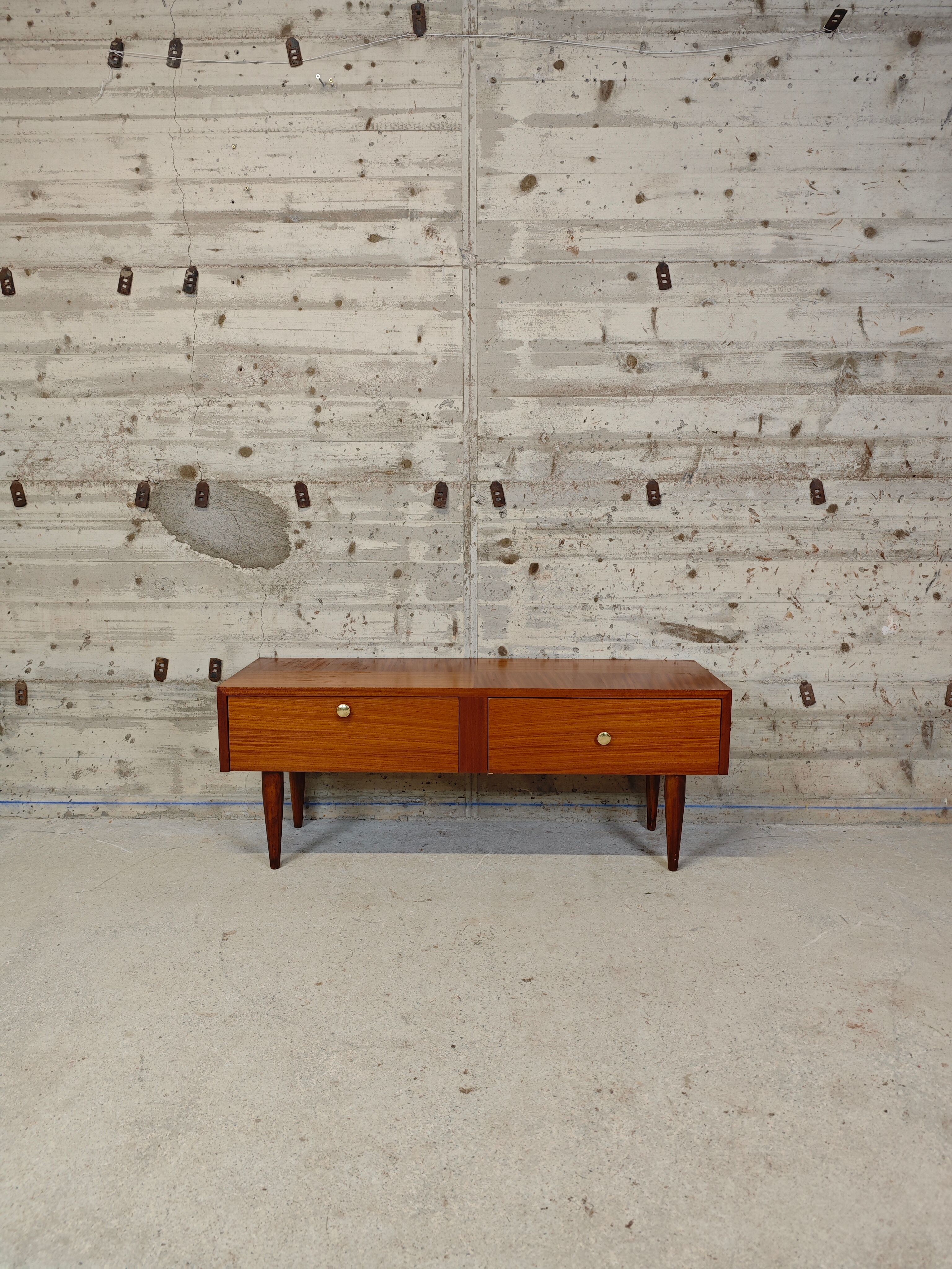 Vintage low furniture, like a TV unit.