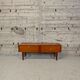 Vintage low furniture, like a TV unit.