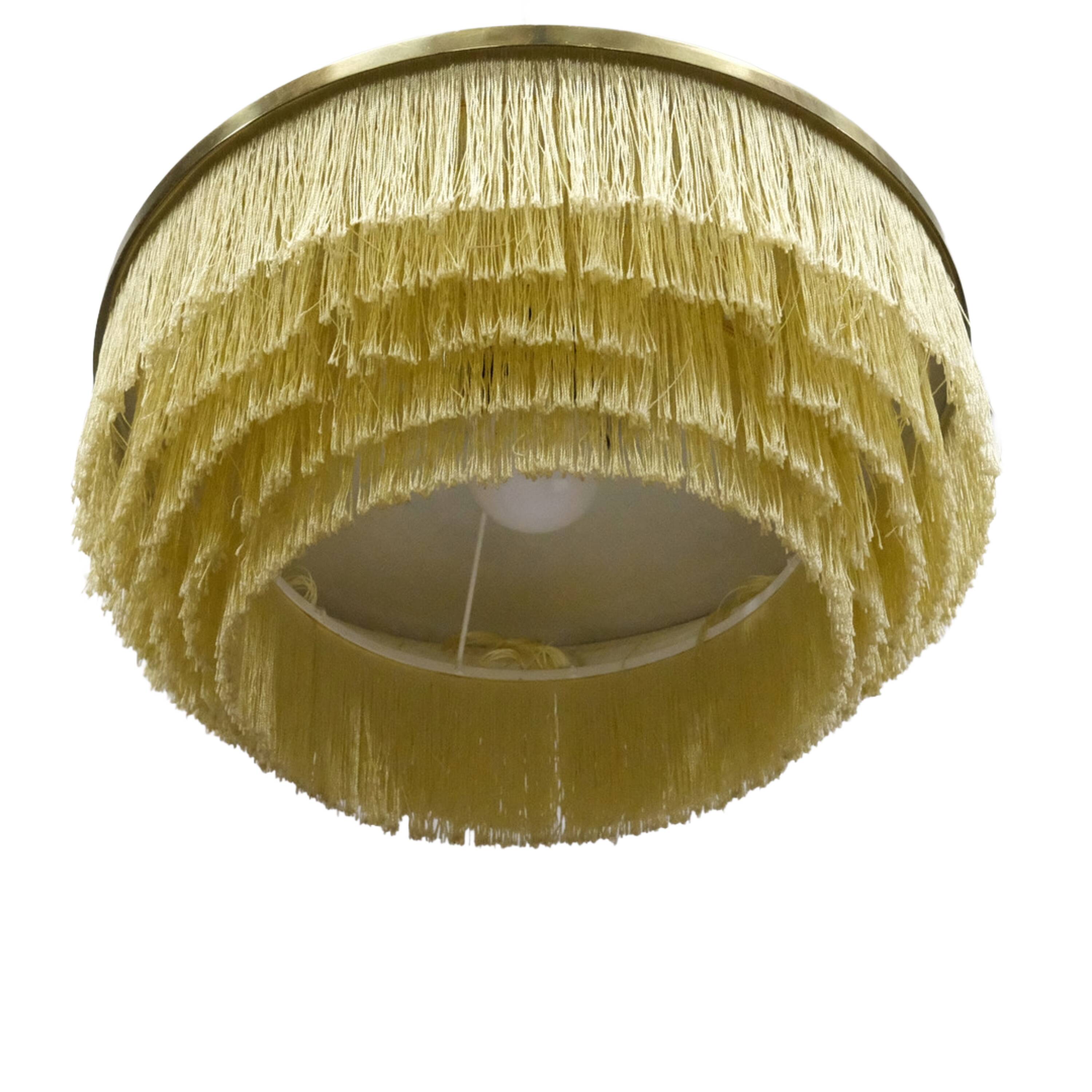 Hans-Agne Jakobsson T-603 pendant lamp in brass with yellow fringes.