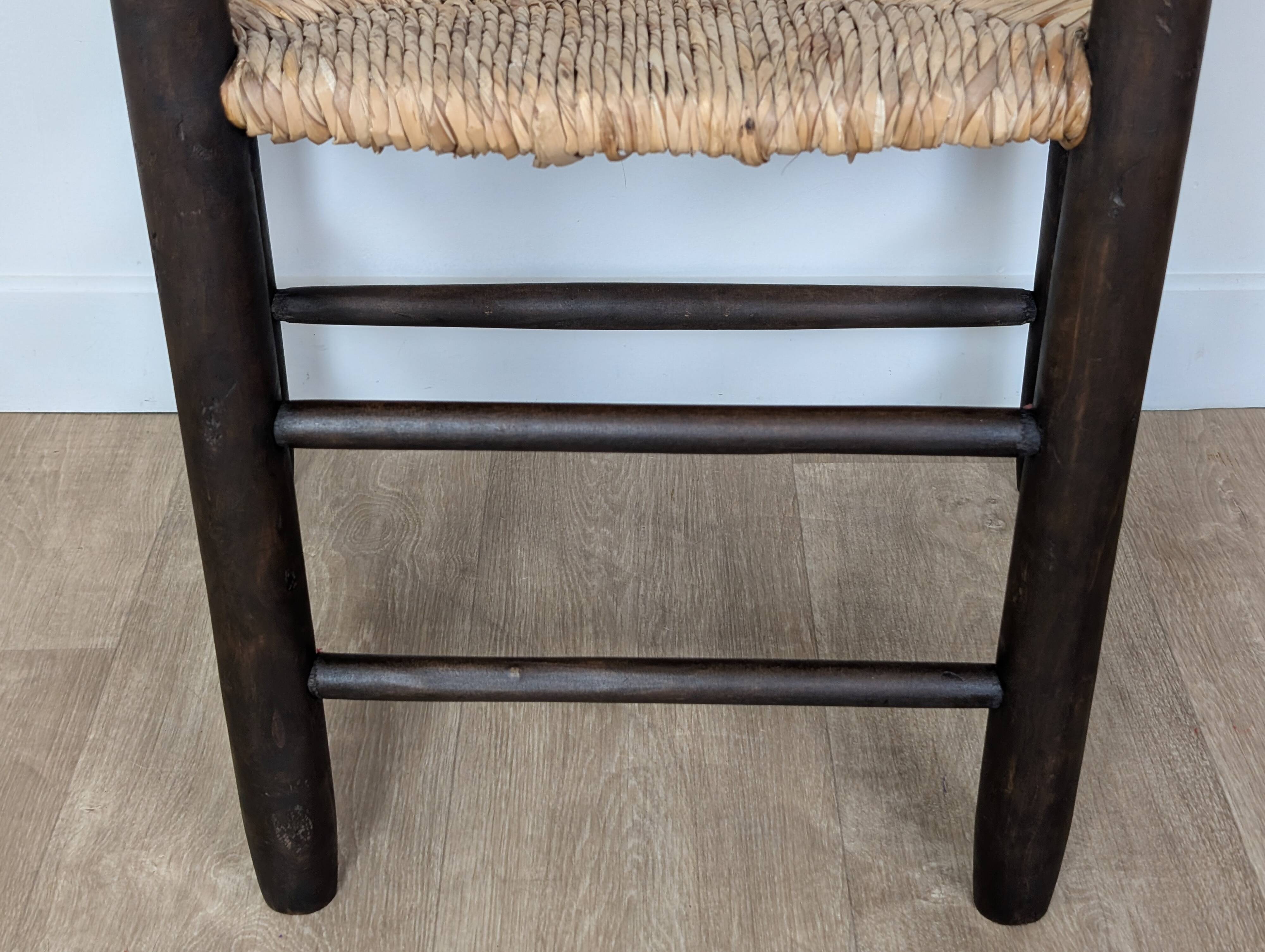 Wooden straw armchair
