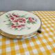 Turntable with earthenware pastry and bakelite floral decoration