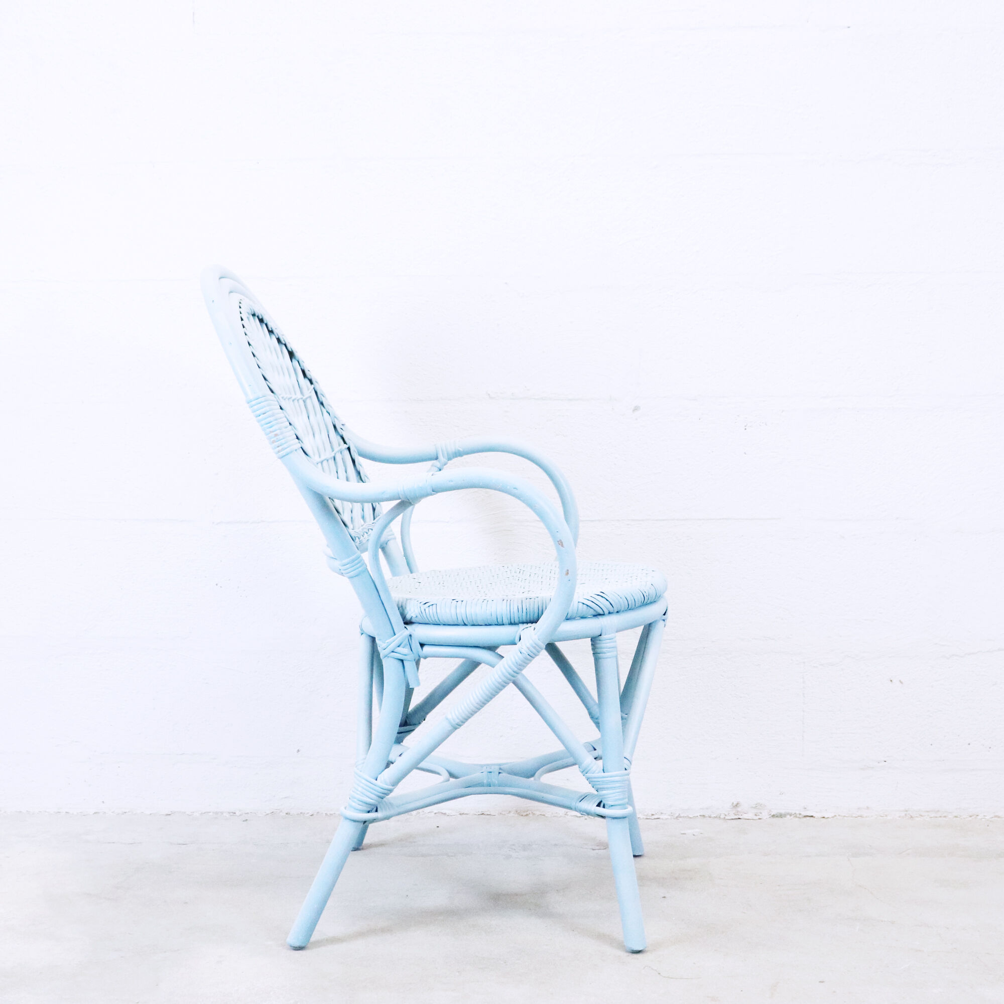Nordic blue braided rattan armchair