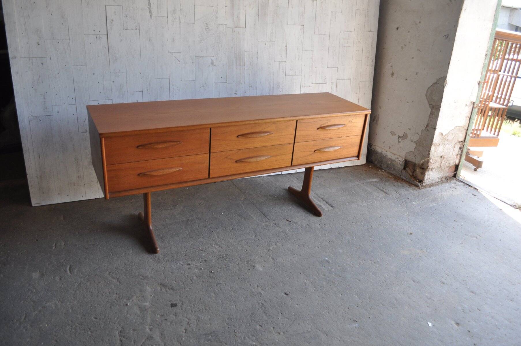 Brown teak sideboard by Frank Guille for Austinsuite, 1960s, 6 drawers, trestle legs.