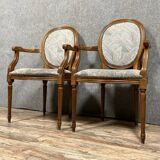 Pair of Louis XVI armchairs with medallion backs circa 1940